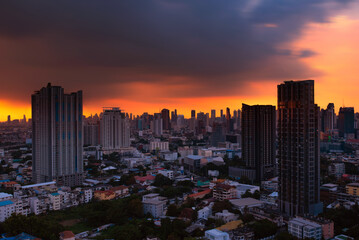 Fototapeta premium Bangkok cityscape with downtown city centre and modern skyscrapers in sunset.