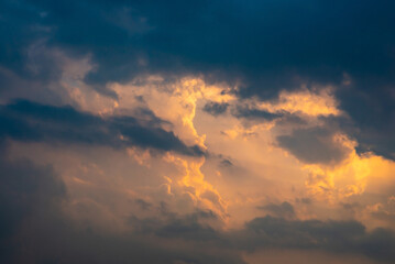 Fototapeta premium Dramatic sunrise and sundown sky background with gentle colorful clouds.