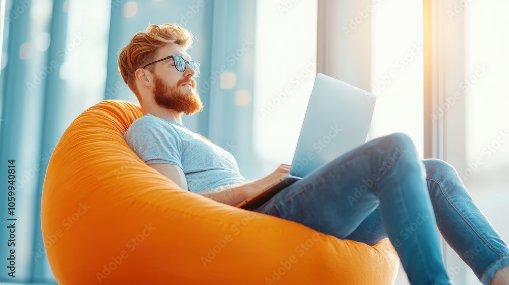 Poster a relaxed programmer lounging on a beanbag chair, reviewing code on a laptop while brainstorming sol