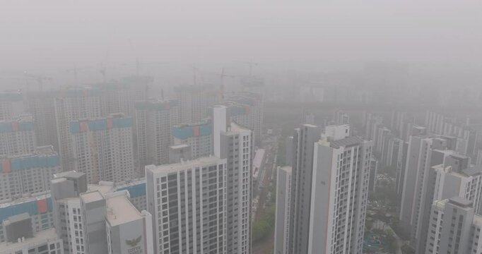 Aerial View of a Large Apartment Complex in Heavy Smog