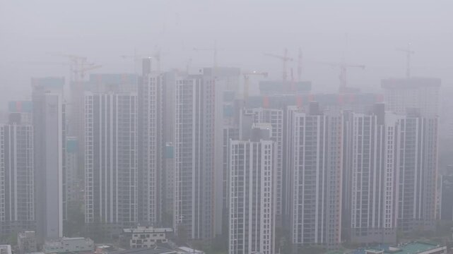 Aerial View of a Large Apartment Complex in Heavy Smog