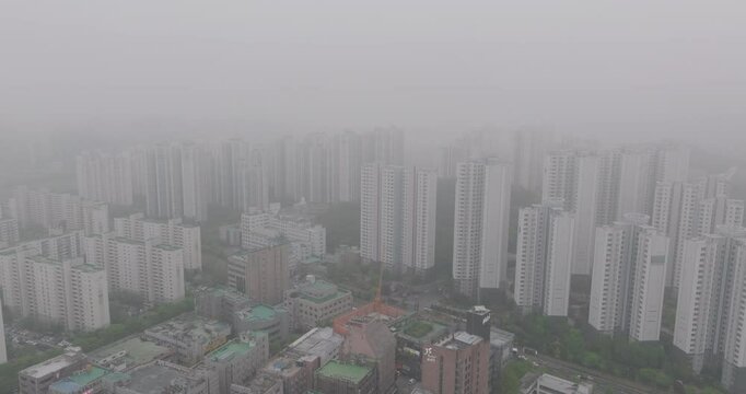 Aerial View of a Large Apartment Complex in Heavy Smog