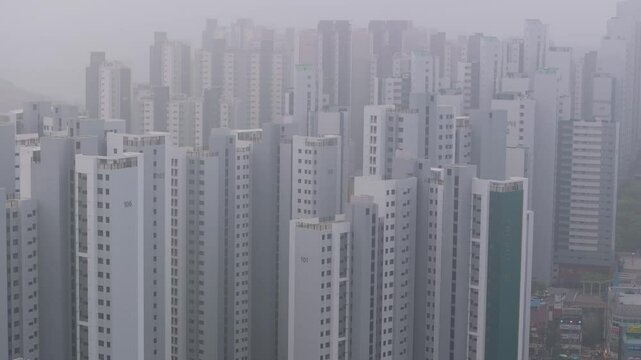 Aerial View of a Large Apartment Complex in Heavy Smog