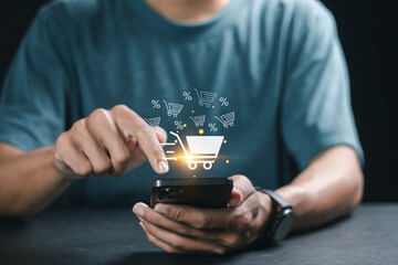 Business ecommerce concept. Marketplace website  online purchase, ecommerce store, online business, shopping on the internet. Man using smartphone with online shopping cart icons.