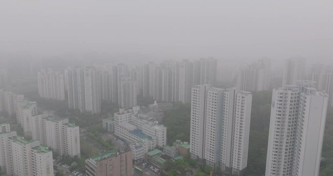 Aerial View of a Large Apartment Complex in Heavy Smog