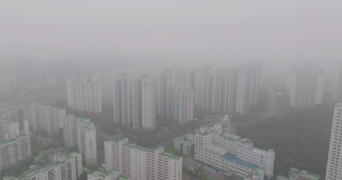 Aerial View of a Large Apartment Complex in Heavy Smog