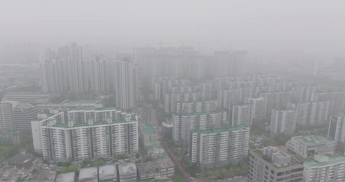 Aerial View of a Large Apartment Complex in Heavy Smog