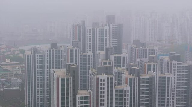Aerial View of a Large Apartment Complex in Heavy Smog