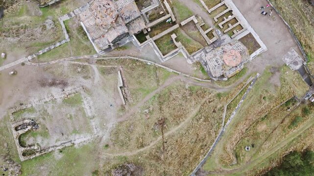 Aerial fly over view Sevanavank monastic complex. Peninsula at the northwestern shore of Lake Sevan in the Gegharkunik Province of Armenia. Group of tourist visit popular travel sightseeing attraction