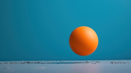 A rubber ball bounces back after being compressed, demonstrating the elasticity of the material and its ability to return to its original shape