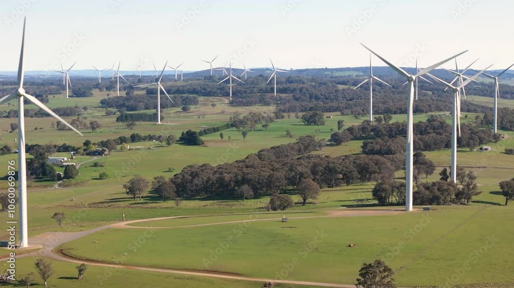 Wall mural aerial drone view of an array of large wind turbines at biala and gullen range wind farm, bannister 