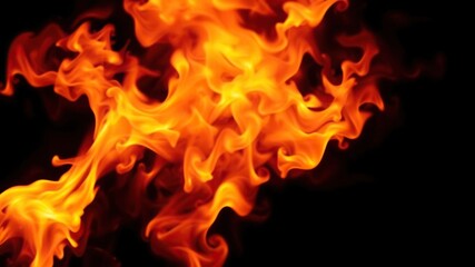 Fototapeta premium Dynamic flames burning on a black background creating a captivating and intense inferno, fire, black, heat