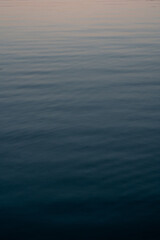 calm water surface at sunset