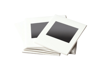 Blank photo slides stacked on each other, ready for memories or presentations, isolated on a white background.