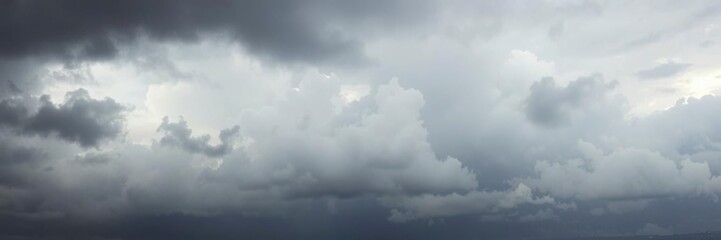 Obraz premium Overcast sky with billowing grey clouds, scenic, moody, cloudy