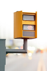 Speed camera capturing traffic violation in city
