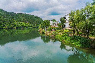 Obraz premium Mountains, Oujiang River, fishing boats, and ancient towns in Lishui City, Zhejiang Province, China
