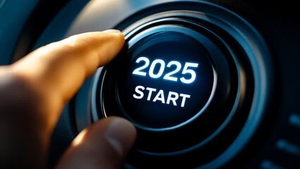 A hand presses a car start button that reads "2025 START".

