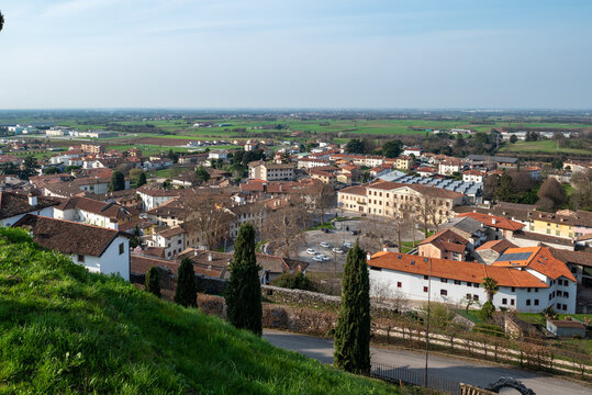 Wide angle top down view of the main square of the city of Fagagna (Pordenone) with its parking lot
