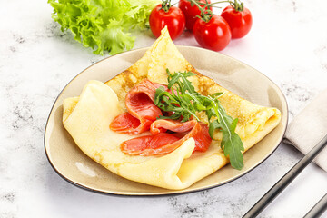 Russian pancake with salmon fish