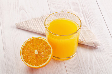 Sweet fresh orange juice in the glass