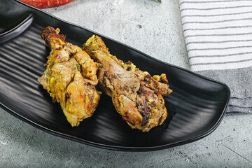 Chicken leg tikka with spices