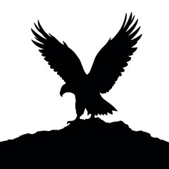 a Golden eagle sitting on the ground silhouette