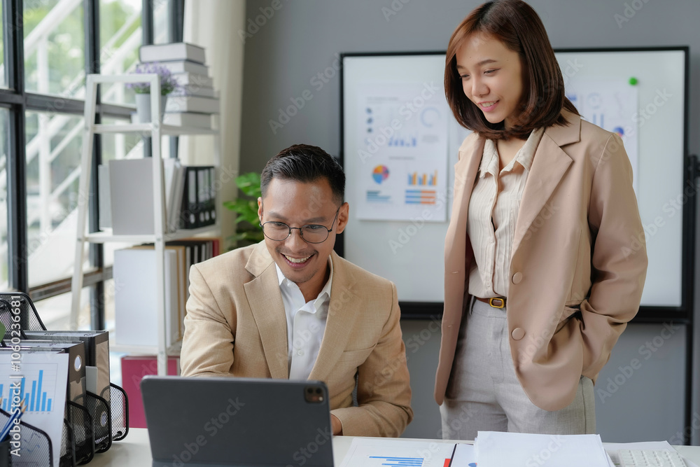 Poster two businesspeople smiling and working together in modern office using tablet, analyzing charts and 