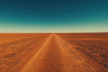 Naklejka premium Arid Desert Landscape with a Long Straight Road Leading to the Horizon, Isolated and Remote, Solitary Scene