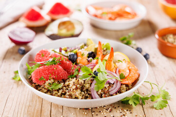 quinoa salad with grapefruit, avocado and shrimp. vegetarian Buddha bowl, healthy eating