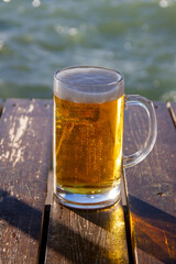 beer glass and sea
