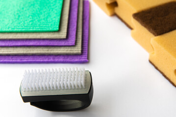 Colourful sponges with visible pores for scrubbing and cleaning.
