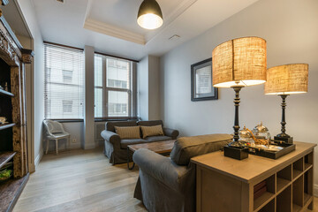Stylish interior of the office lounge. Cozy atmosphere, soft sofas, original table lamps.