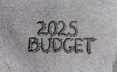 Planning budget 2025 new year symbol. Concept words Budget 2025 written on beautiful sand beach. Beautiful sand beach background. Business budget 2025 new year concept. Copy space.