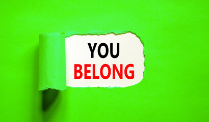 Belonging and you belong symbol. Concept words You belong on beautiful white paper. Beautiful green paper background. Business belonging and you belong concept. Copy space.