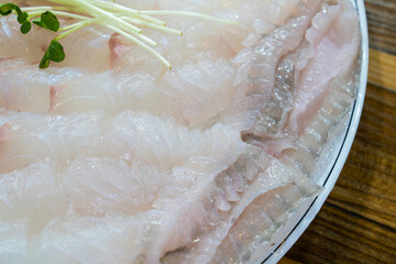 sashimi of flatfish on the dish