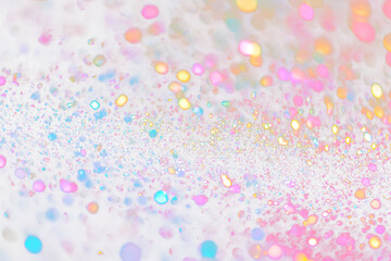 Abstract transparent  background with colorful glitter bokeh.