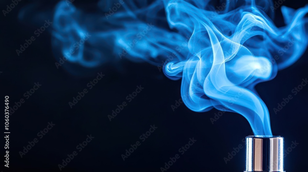 Poster captivating blue smoke swirling from a metallic source against a dark background, creating an ethere