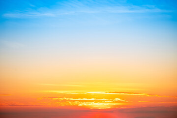 Fototapeta premium Beautiful , luxury soft gradient orange gold clouds and sunlight on the blue sky perfect for the background, take in everning,Twilight, Large size, high definition landscape photo