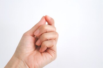 握り締めた女性の左手