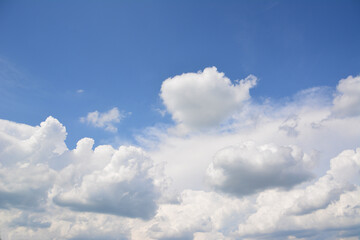 Obraz premium a background with blue sky and a lot of white clouds copy space 