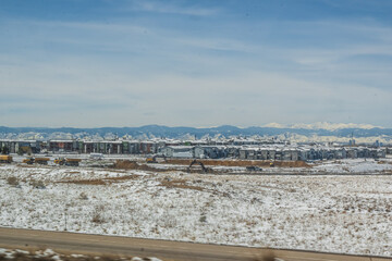 Driving through Colorado, the snowy peaks seem close enough to touch yet vast enough to dream, Colorado, United States of America