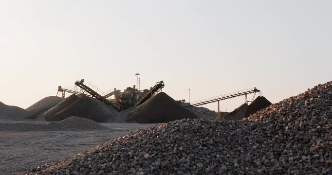 Screening and washing in open-pit mining. Belt conveyor in mining quarry. Gravel and sand extraction