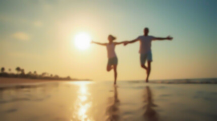 Fototapeta premium Silhouettes of a couple running on water against the backdrop of a sunset on a tropical island, with a blurred image