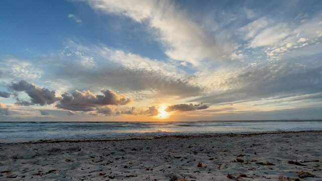 Sunset on the beach over the sea in mallorca