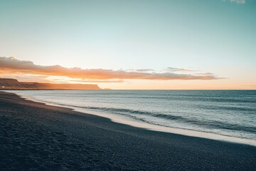 Obraz premium A serene sunset scene over the ocean on a cloudy day, perfect for travel or nature-themed projects. Beautiful simple AI generated image