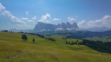 View of the Seiser Alm (Alpe di Siusi in Italian), one of the biggest alpine meadows on the Dolomites, with the Sassolungo and Sassopiatto peaks on the background 