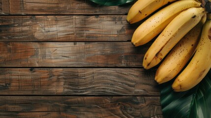 Bananas on Wooden Table Arranged with Space for Text
