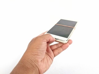 Male hand holding a broken Android cellphone on a white background