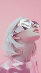 futuristic model with reflective mask poses against soft pink background, showcasing blend of modern fashion and artistic expression
